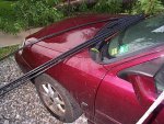 Phone cables over the hood and windshield.
